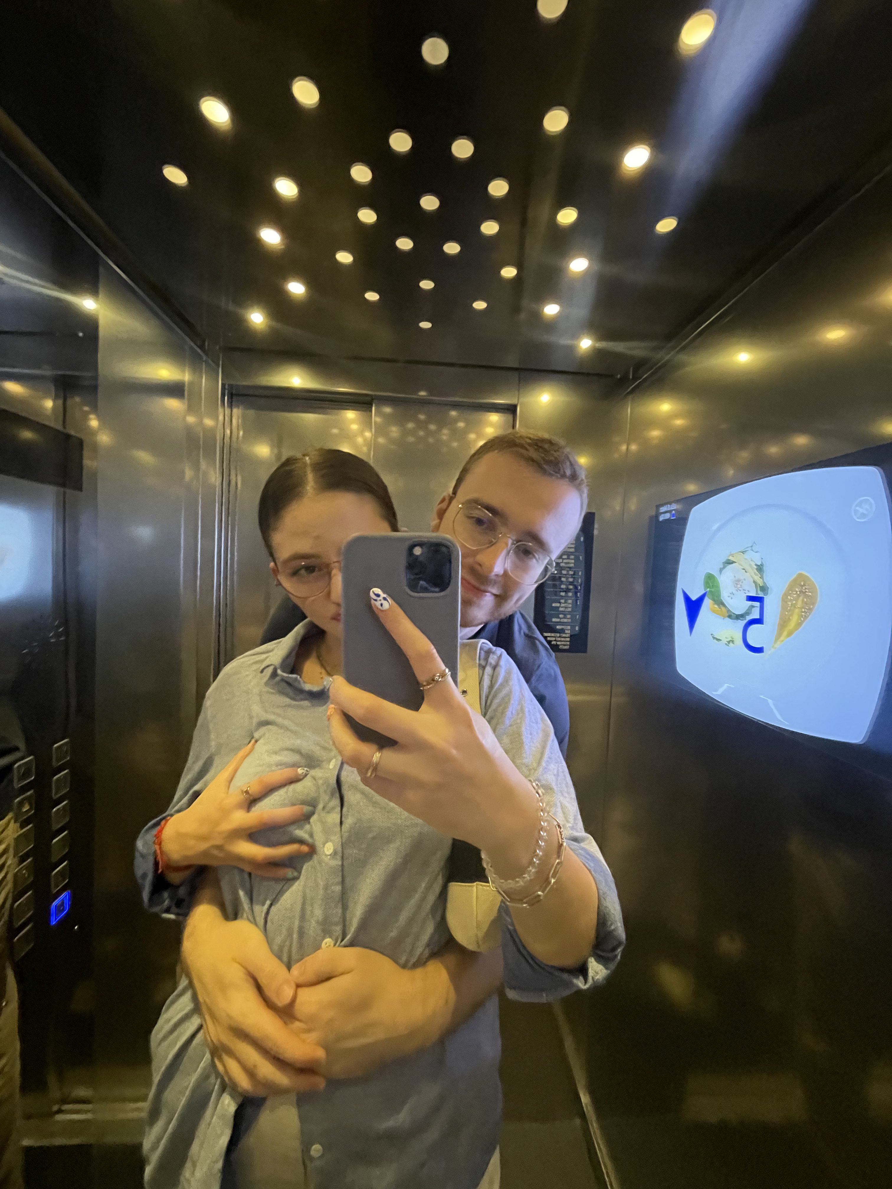 … SANG IN the elevator